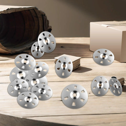 Stainless steel flat washers for screws, 1-1/8 inch, 304 stainless, scattered on wooden surface near a box