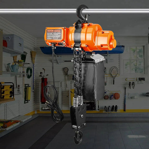 Electric Chain Hoist 2200 Lb 20 Ft Lift 120V Single Phase Remote Control hanging in garage