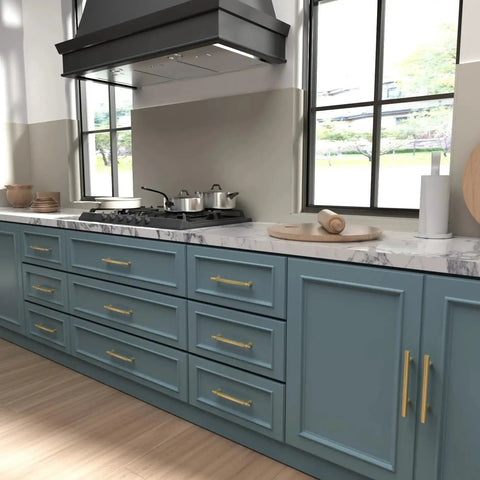 Gold Brushed Finish Cabinet Pulls Set Of 10 3 Inch Drawer Handles in zinc alloy on blue kitchen cabinets with 76mm hole centers.