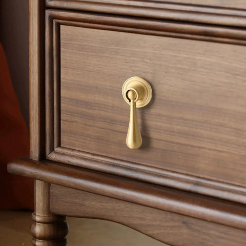 Solid Brass Cabinet Knobs 2 Pack In Brushed Gold Finish on wooden dresser drawer