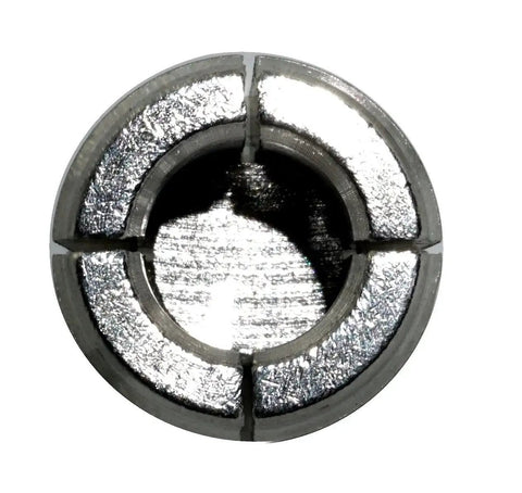 Top view of drop in concrete anchor one half inch inside diameter one half inch thirteen thread zinc plated with setting tool.