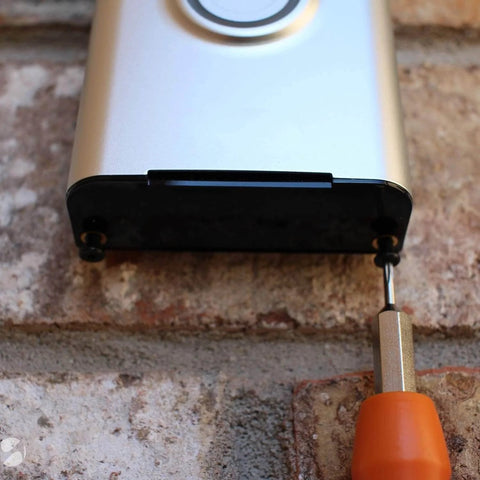 Video Doorbell Screwdriver Set With Torx T6 And T15 Bits for Battery Replacement and WiFi Reset in use on doorbell