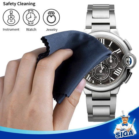 Hand using Premium Microfiber Cloths For Lenses Screens Glasses Six Pack 6 x 7 Inches to clean a metal watch