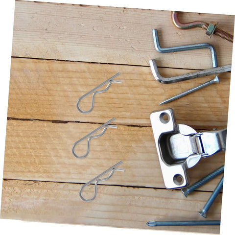 Versatile Cotter Pin Clips Set For Trailer Hitches And Equipment 20 Pieces Spring Fasteners on wooden surface