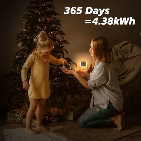 Mother and child with 8 Pack Dusk To Dawn Wall Plug Night Lights 3000K Warm White LED on wall, Christmas tree background