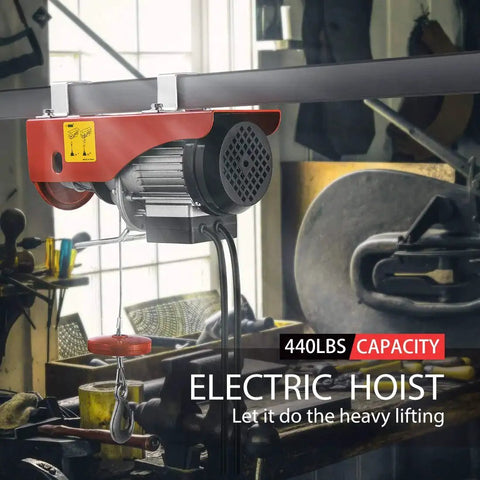 Electric Hoist 440 Lbs Winch 110V With Remote Control ETL Listed 38 Ft Lift installed in garage, red motor visible