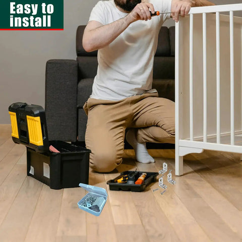 Person using 20 Pack L Bracket Corner Brace Set In Stainless Steel 30mm By 30mm 2mm Thick Right Angle Joints to assemble furniture