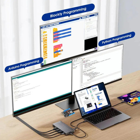 Smart Robot Car Kit For Arduino And ESP32 Controllers setup with monitors displaying Blockly, Python, and Arduino programming