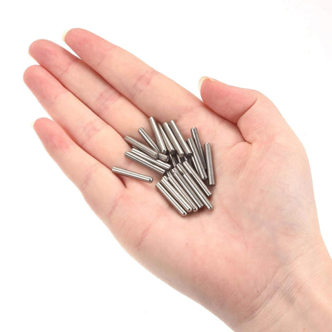 Hand holding 304 Stainless Steel Dowel Pins 3x20mm Round Head Flat Chamfered End 50 Pack for woodworking and furniture use