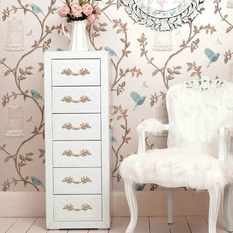 Pack Of 5 European Style Vintage Cabinet Handles And Drawer Pulls on a white dresser in a vintage-themed room