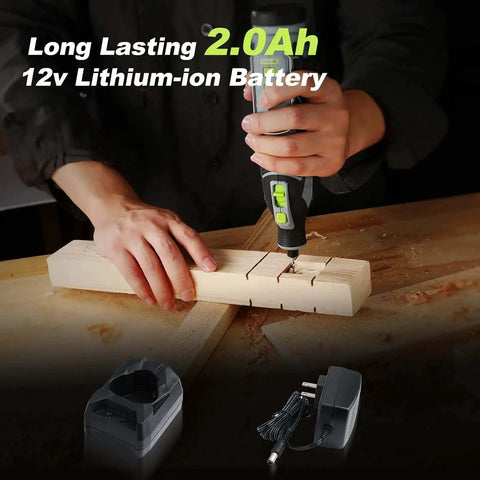 Person using Cordless 12V Rotary Tool Kit With 5 Speed Settings, 114 Easy Change Accessories on wood, charging dock visible.