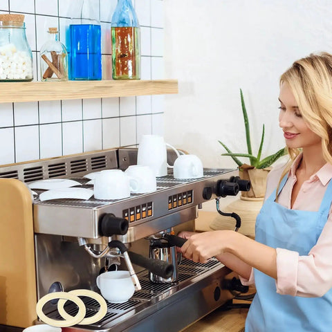 Woman installing 54mm Silicone Steam Ring Replacement Gasket for Espresso Machines Dope Fit on Breville and Sage models