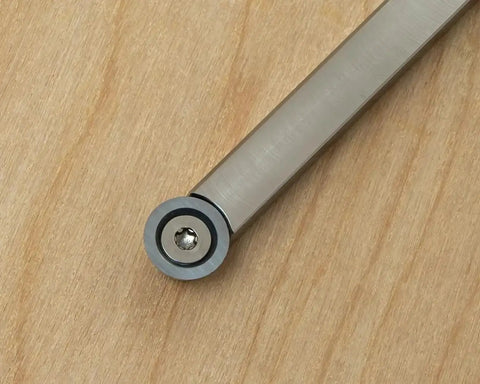 Close-up of a tool from the 3 Carbide Wood Turning Tools Set With Rougher Finisher Detailer And 12 Inch Color Coded Solid Aluminum Lathe Tool Handles USA Made For Easy Tool Selection And No Fuss Pro Grade Woodturning Precision.