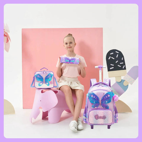 Girl with 3D butterfly rolling backpack set, including lunch bag and pencil case, for kids ages 5-12.