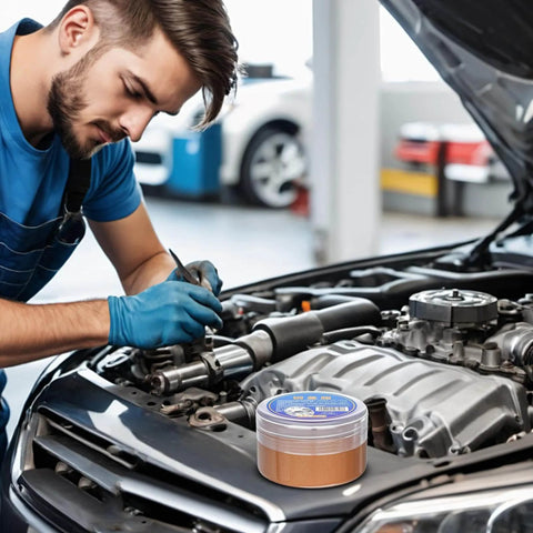 Mechanic using Copper Based Anti Seize Grease With High Temperature Protection on car engine for automotive brake assembly.