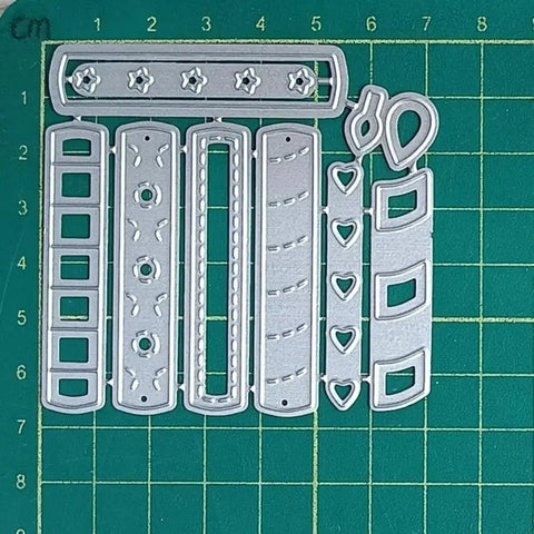 Happy Birthday Balloons Metal Die-Cuts For Scrapbookers And Card Makers on green grid background