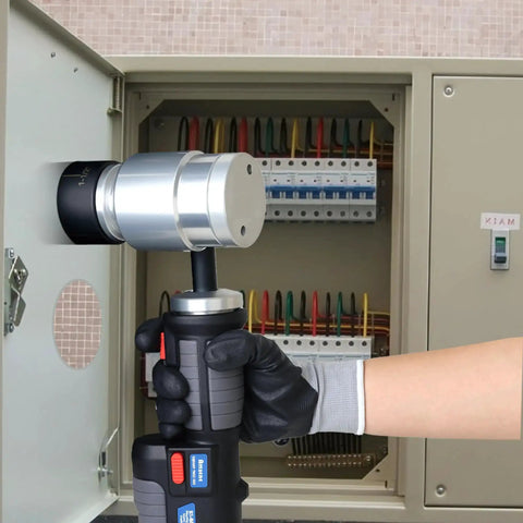 Battery Powered Hydraulic Knockout Punch Kit EZ 8AL being used to punch a hole in a metal electrical enclosure