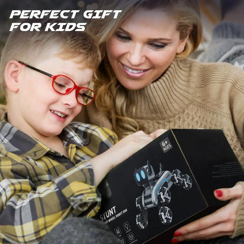Child with adult holding box of Dynamic Eight Wheel Robot Dog RC Stunt Car With Gesture Sensing Remote Mecanum Wheels For 360 Degree Mobility
