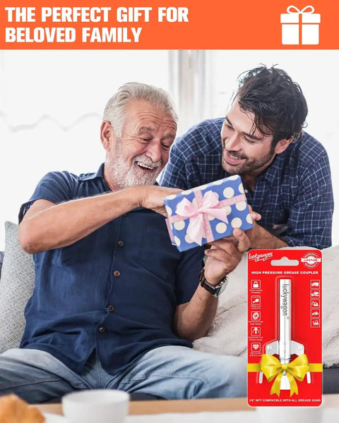 Two people sitting on a sofa sharing a gift, packaging for a high pressure grease coupler with bow visible nearby.
