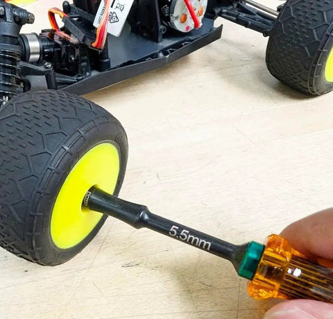 Using Gen 2 Amber Handles Hex Driver Set Three Pack For Precision RC Tools And Electronics to adjust RC car wheel.