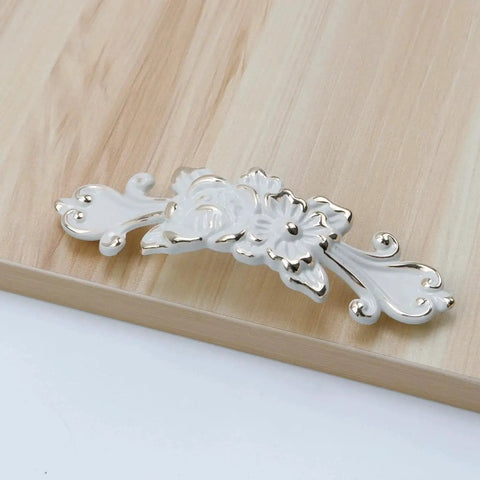 Ivory Decorative Cabinet Pull Handles Set Of 2 Zinc Alloy Flower Drawer Pulls for cabinets with vintage kitchen style design.