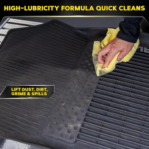 All Surface Interior Detailer That Cleans Plastics Vinyl Leather And Rubber With No Greasy Residue And Sun Blocking Protection, Spray On Wipe Off, 16 Oz Meguiars being used on a rubber mat to lift dirt and spills.
