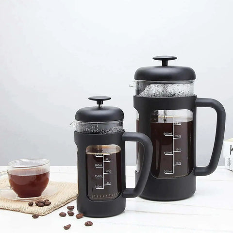 12 Oz French Press Coffee And Tea Maker With Borosilicate Glass Carafe And Soft Grip Handle shown with coffee brew