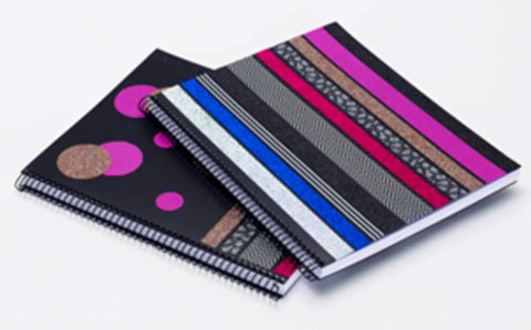 Two spiral notebooks decorated with Fun Dots Washi Tape 6-Roll Set, .59 in x 393 in for journaling and scrapbooking.