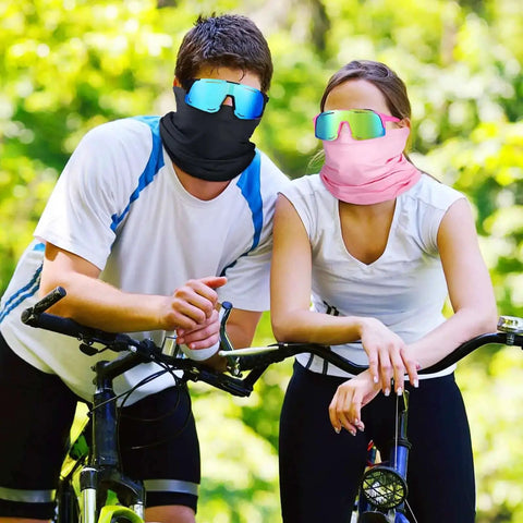 Two cyclists wearing 24 Piece Polarized Sports Sunglasses And Breathable Neck Gaiter Face Mask Set For Men Women outdoor gear.