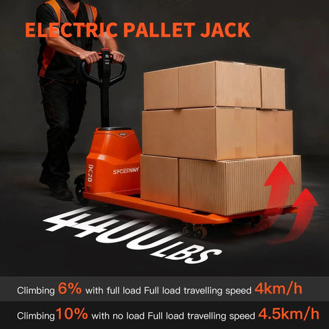 Electric orange pallet jack pushing stacked cardboard boxes on a pallet with 48 x 27 in forks.