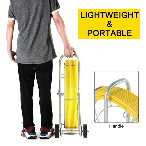Person holding Beefy Heavy Duty Fiberglass Duct Rodder 8mm By 150m 492ft on wheel stand, showing lightweight portability