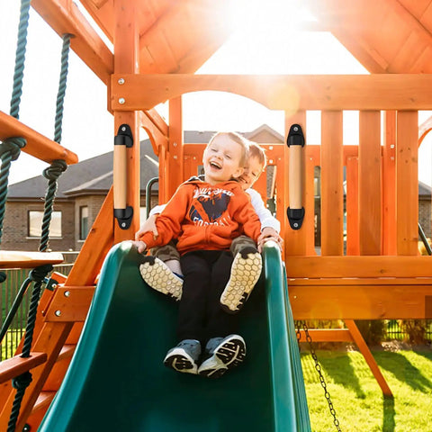 Children playing on a slide, showcasing 9 Inch Beech Wood Barn Door Pull Handle With Plastic Brackets Smooth Round Edges For Safe Kids.