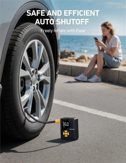 Compact Portable Tire Inflator For Cars Bikes And Balls With 150 PSI Pump Built In Tire Pressure Gauge And LED Light Ultra Quick Inflation For Car Truck Motorcycle And Bike AstroAI L7 Mini displayed next to a car tire.