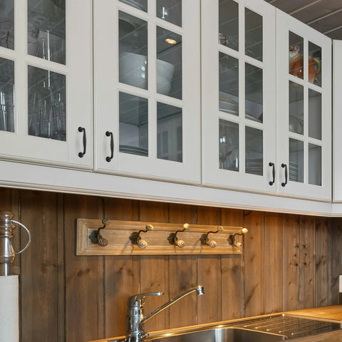 White kitchen cabinets with 10 Pack Matte Black 3-3/4 Inch Kitchen Cabinet Handles Solid Zinc Alloy Cupboard And Drawer Pulls installed