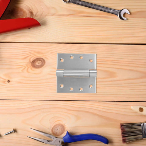 Self Closing Stainless Steel Spring Hinges For Doors With Quiet Operation Heavy Duty Interior And Exterior Door Hardware For Residential Use By VillCase Moisture Resistant Durable Hinges Ideal For Kitchens Bathrooms And High Traffic Entryways, shown on wooden surface with tools.