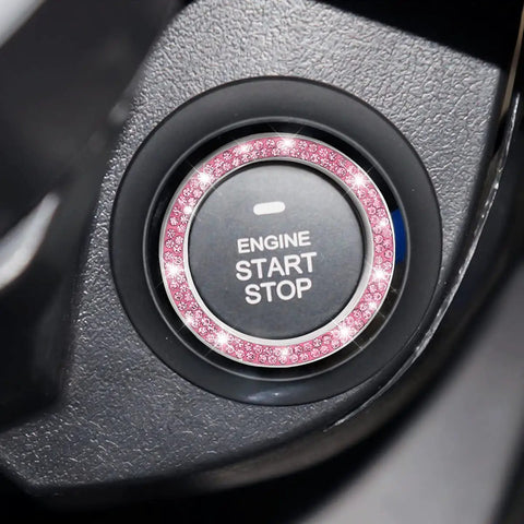 Close-up of Pink Car Start Button Bling Ring Set 2 Pack Crystal Rhinestone Decals installed on engine start button.