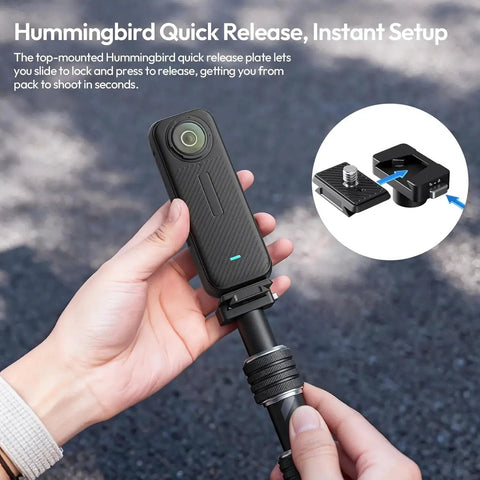 Person holding Invisible Quick Release Selfie Stick Motorcycle Mount Kit with 40 inch adjustable pole and camera attached.