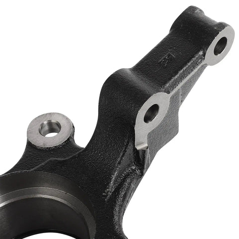 Close-up of front steering knuckle for Sentra 2000-2006 showing metal construction, part of wheel bearing hub assembly