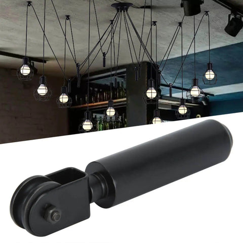 Chandelier Pulley Lighting Kit With Black Iron Wheel Bearing Rod For Easy Pendant Lifts And Swag Lamp Installations in a room setting