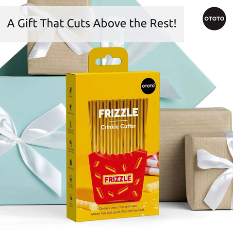 Packaging of Frizzle Crinkle Fry Cutter Turns Potatoes Into Waffle Fries And Fun Veggie Crinkles, displayed among gift boxes.