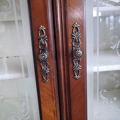 Antique Bronze Vintage Style Cabinet Knobs Set For Furniture Drawers Dressers Closets installed on wooden cabinet doors