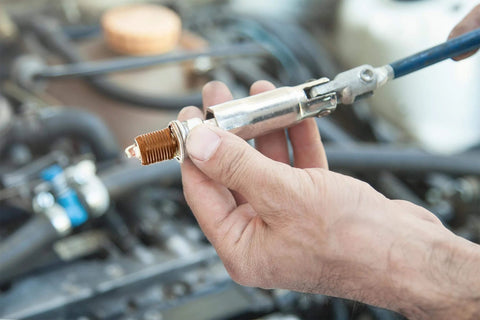 Application of Copper Based Anti Seize Lubricant 11 Oz For High Temperature Fasteners Up To 1202 F Protecting Spark Plugs