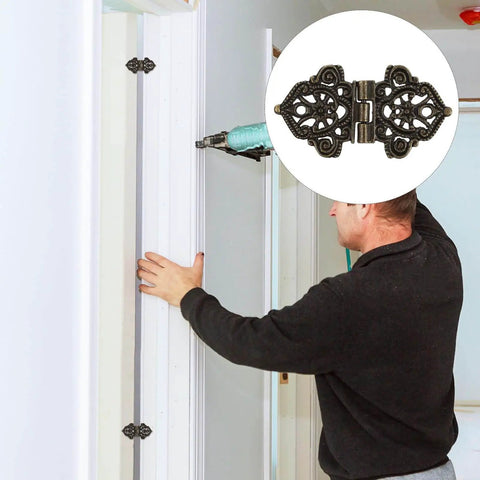 Installation of Antique Zinc Alloy Butterfly Hinges Set on a door frame, part of the 10 Pieces Miniature Furniture Hinges for DIY Projects.