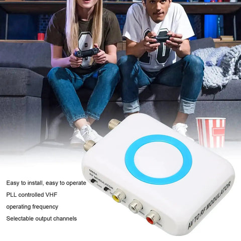 Digital RF Modulator And NTSC Coaxial Converter For CATV Systems with AV inputs and multiple channel options next to gamers.