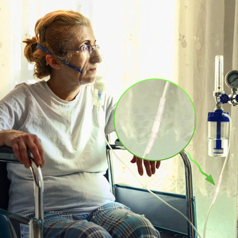 IOOYIFLE oxygen tubing swivel connector, white plastic, male-to-male, shown on nasal cannula tubing
