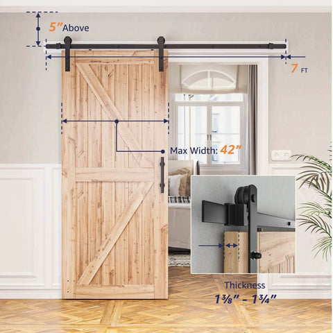 7ft Barn Door Hardware Kit with I shape hanger shown installed on 42-inch wooden door, highlighting black sliding carbon steel track and rollers.