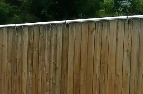 8 Foot Kit For Safe Fenced Yards With Coyote Roller System Keeps Cats And Dogs Contained And Coyotes Out on wooden fence