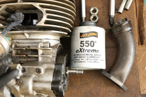 Non Metallic Anti Seize Compound 550 Extreme Military Grade Lead Free With Molybdenum Disulfide beside engine components