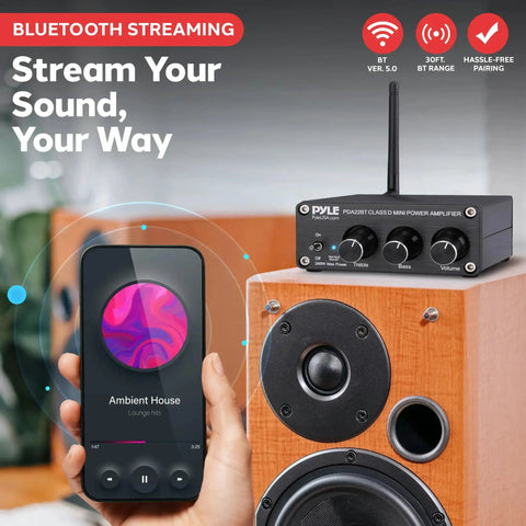 240W Mini Bluetooth Home Stereo Amplifier With 2 Channel Output beside speaker and smartphone, showcasing Bluetooth streaming.
