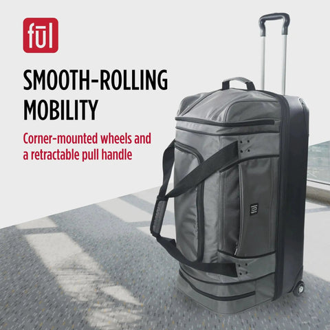 30 Inch Rolling Duffel Bag From Ful With Split Level Storage And Hard Shell Base, showing smooth-rolling wheels and pull handle, grey.